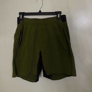 LULULEMON dark green running shorts unlined with pockets size Small